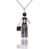 SARANA&reg; &ldquo;Gentleman&rdquo; jewelry doll pendant with black agate on a white background
