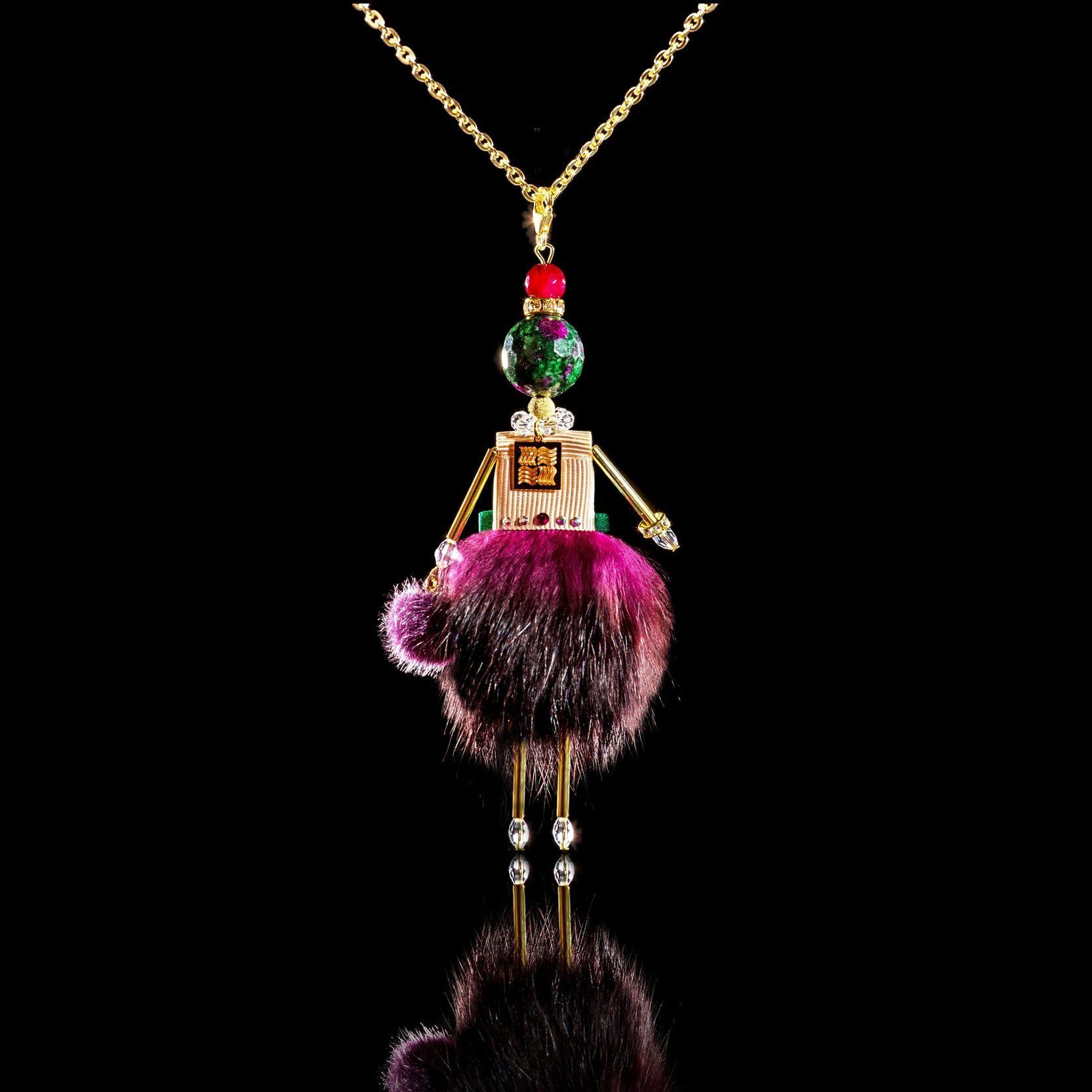 Jewelry doll pendant "Purple Lady" on a black background