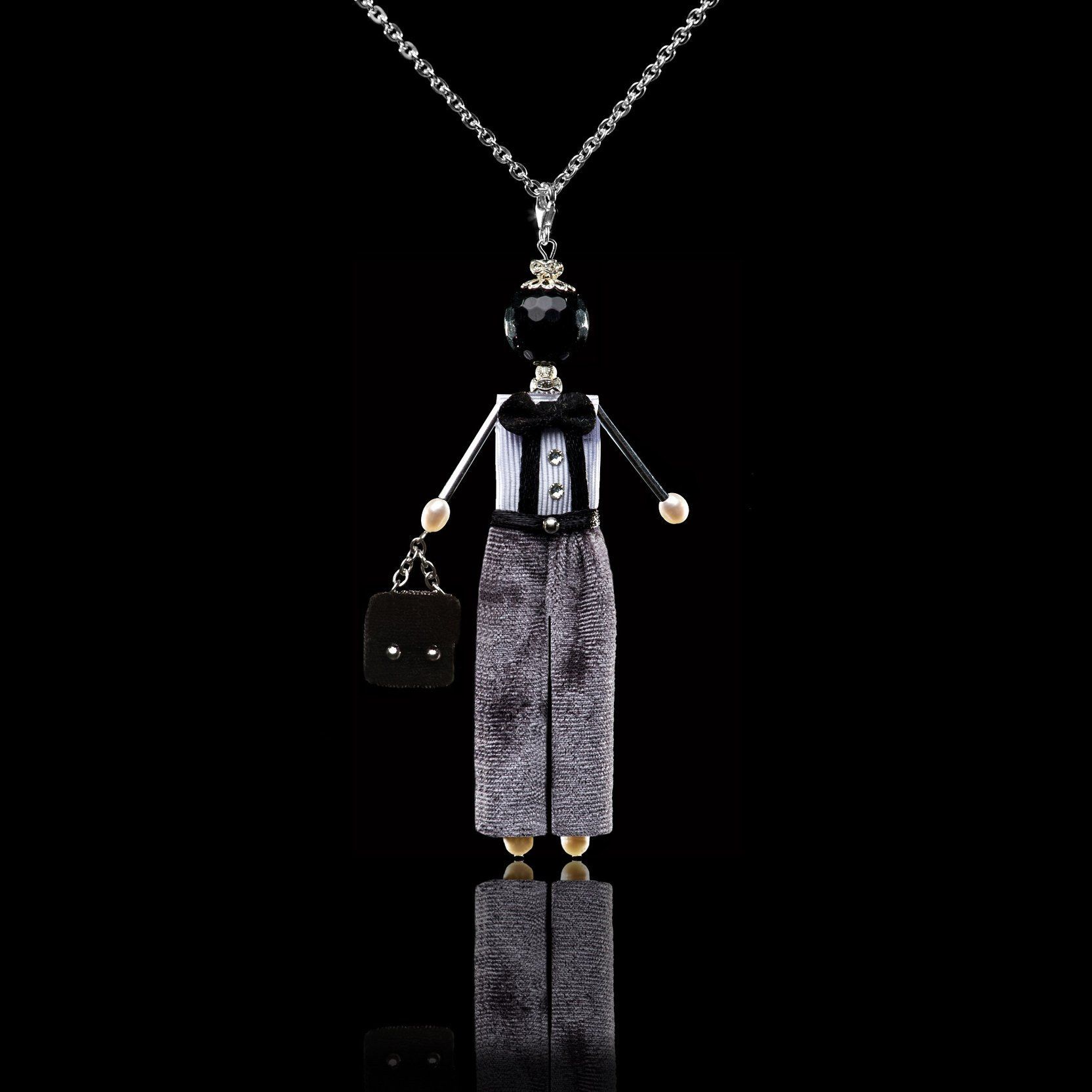 SARANA&reg; &ldquo;Gentleman&rdquo; jewelry doll pendant with black agate on a black background