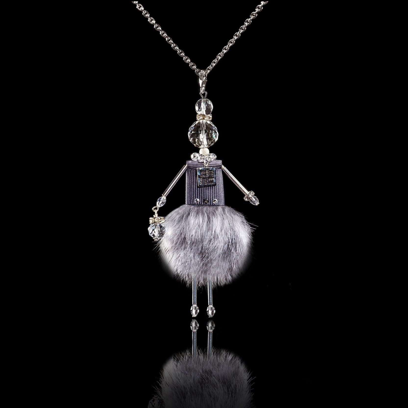 Jewelry doll pendant "Grey-Eyed Beauty" on a black background