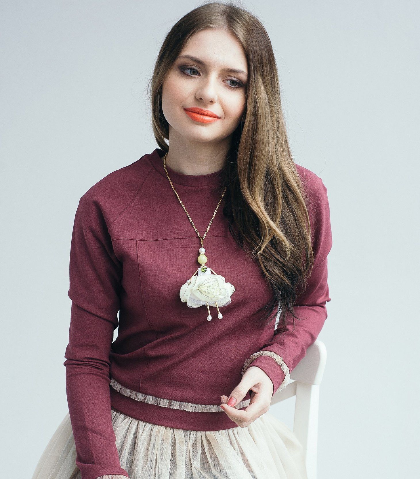 SARANA&reg; Lemon Rose jewelry doll pendant worn by a model &mdash; elegant Spanish designer jewelry for women