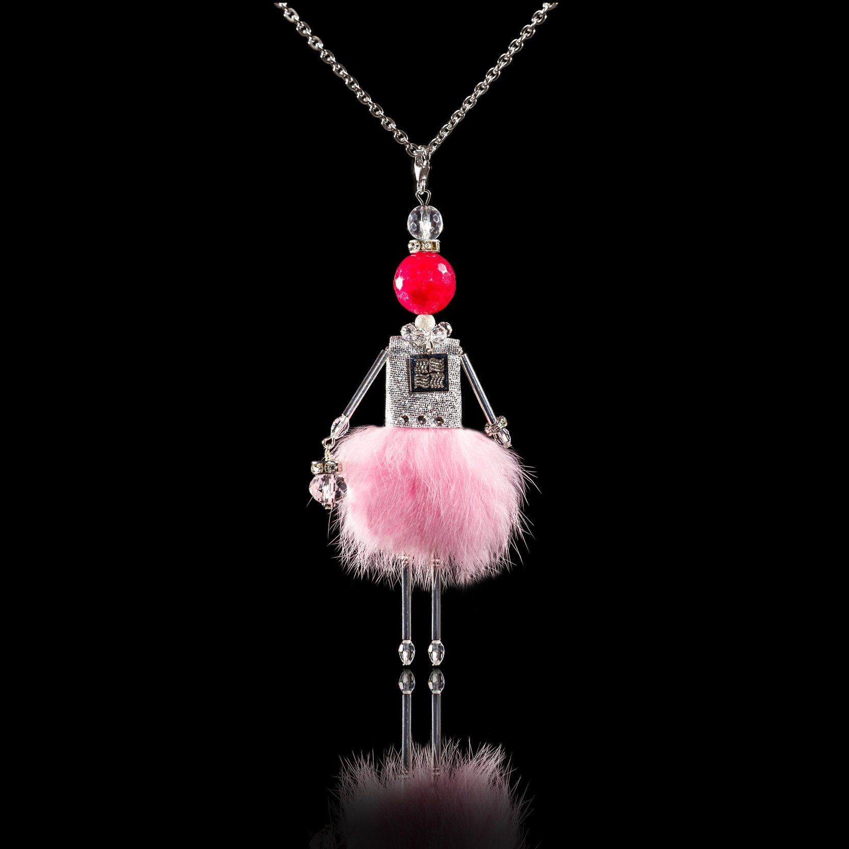 Jewelry doll pendant "Sharon Rose Beauty" on a black background