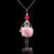 Jewelry doll pendant "Sharon Rose Beauty" on a black background