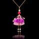 SARANA jewelry doll pendant &ldquo;Fuchsia&rdquo; on black background luxury statement jewelry