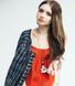 SARANA jewelry doll pendant &ldquo;Coquette&rdquo; worn by model in elegant fashion look