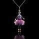 Jewelry doll pendant "Lilac Snowflake" on a black background