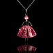 Doll-pendant in a silk skirt in the color of an ashy rose