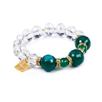 Crystal bracelet with green agate and jade on white background