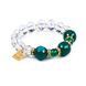 Crystal bracelet with green agate and jade on white background