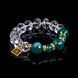 Crystal bracelet with green agate and jade on black background