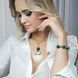 Crystal bracelet with green agate and jade worn with matching doll pendant on model