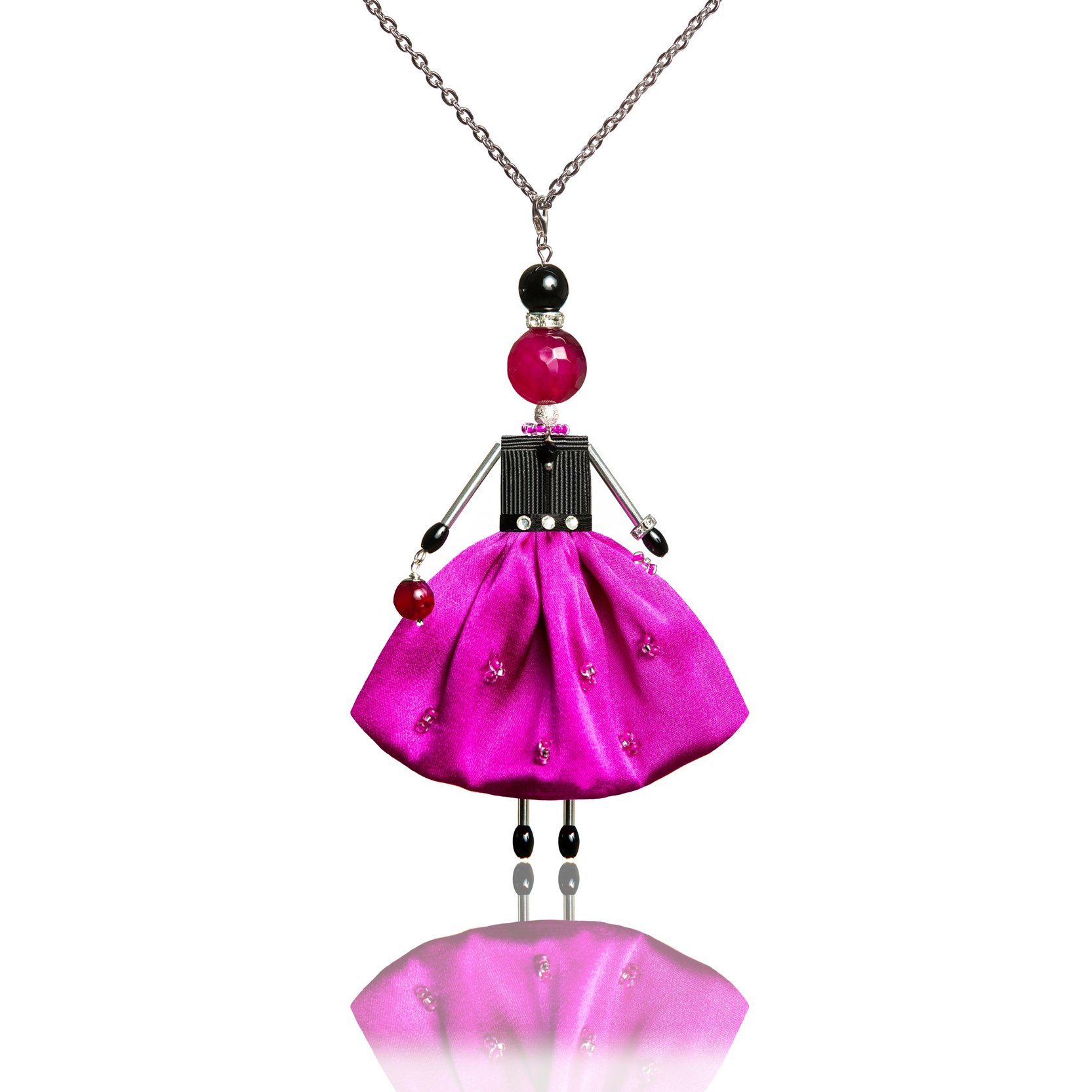 Unique doll-pendant in bright pink fuchsia