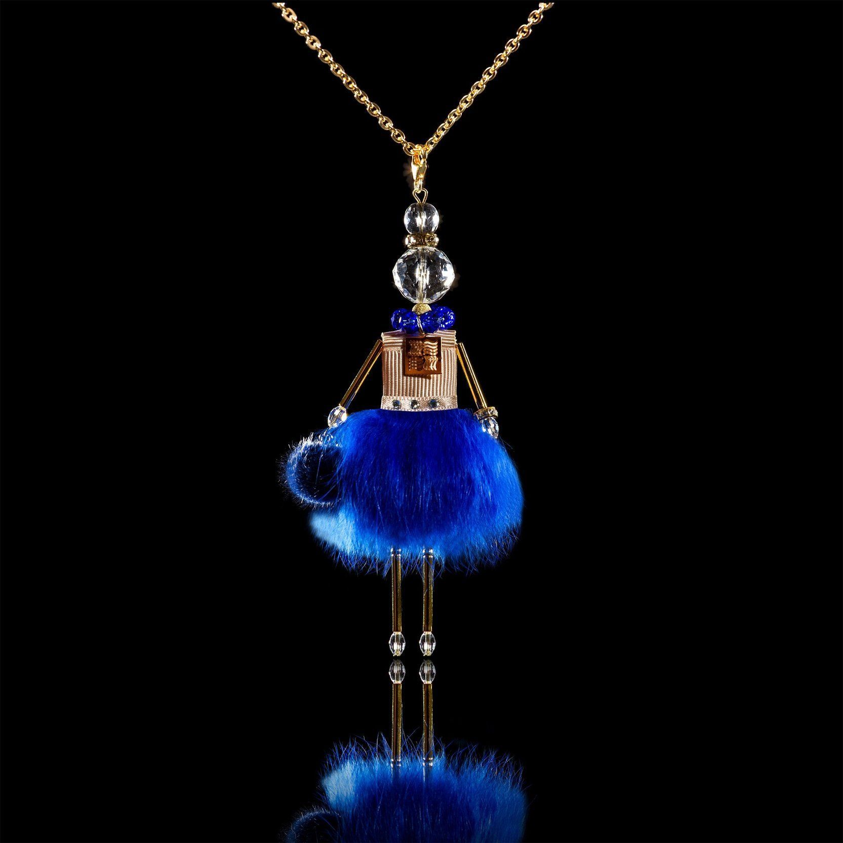 Jewelry doll pendant "Cornflower Fairy" on a black background