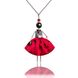 Luxurious pendant doll in a burgundy-colored silk skirt