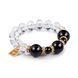 Crystal bracelet with natural black agates and zirconia accents on white background