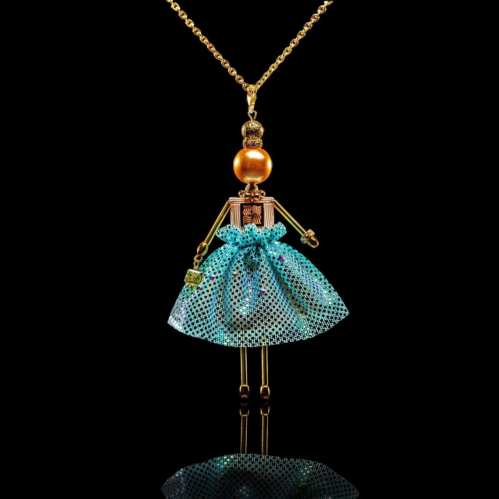 SARANA&reg; Ariel Jewelry Doll Pendant with a gold-colored pearl on a black background