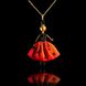 Cheerful doll-pendant in fiery red color.