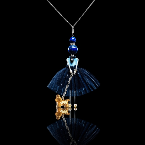 Pendant doll in divine blue with a small dog.