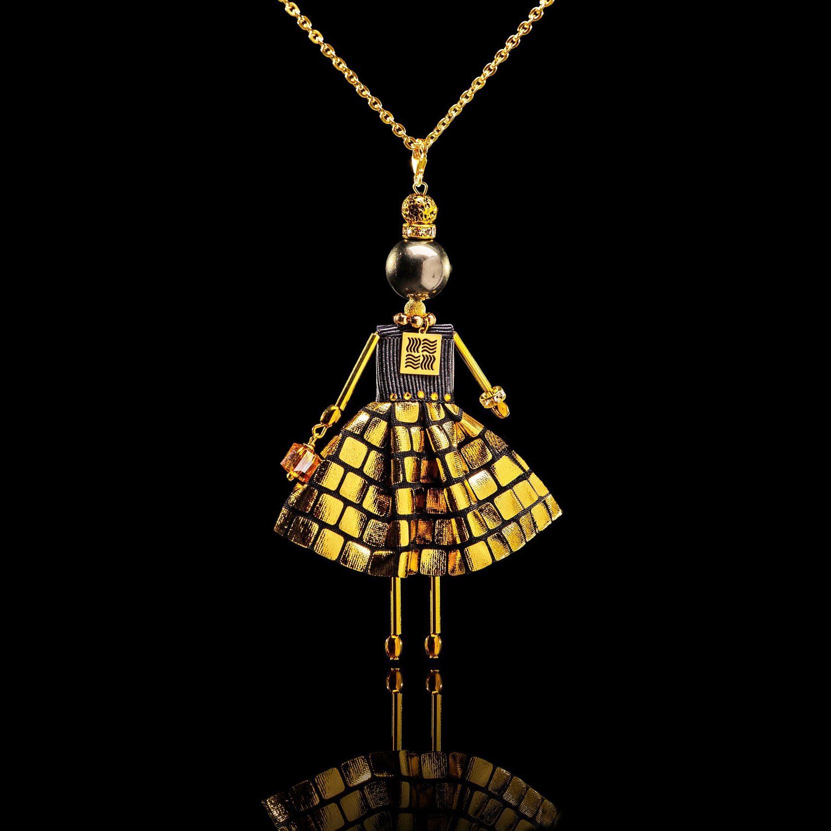 SARANA&reg; Aurelia Jewelry Doll Pendant on a black background
