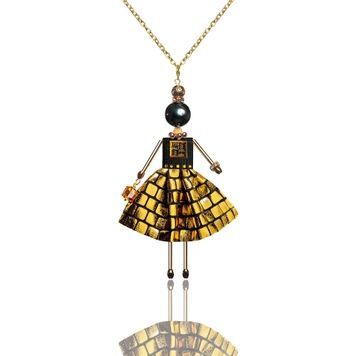 SARANA&reg; Aurelia Jewelry Doll Pendant on a chain on a black background