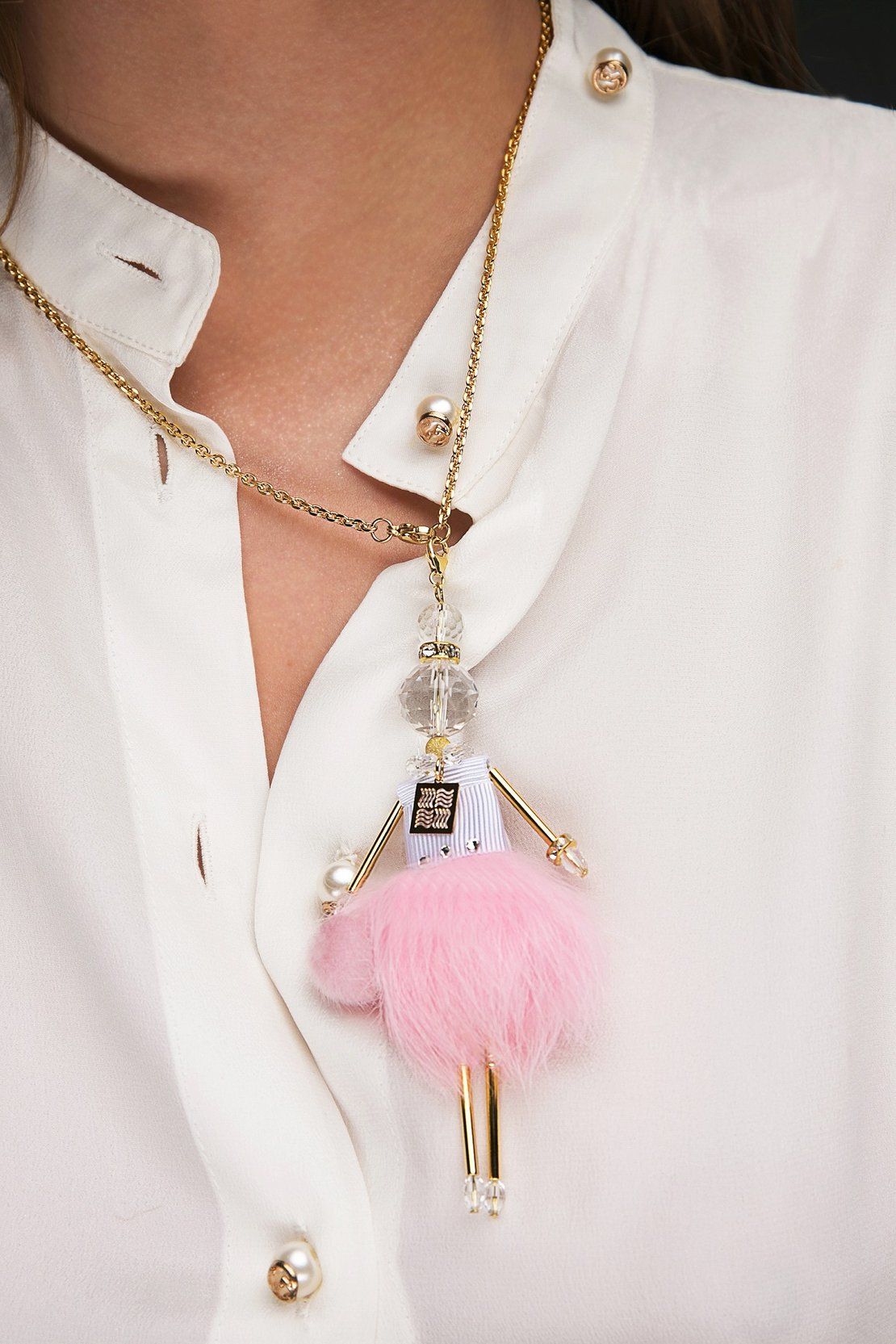 Jewelry doll pendant "Pink Princess" worn by a model
