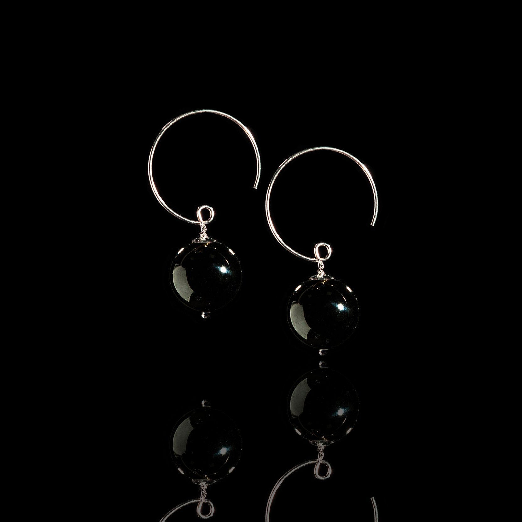 Silver earrings with black agates