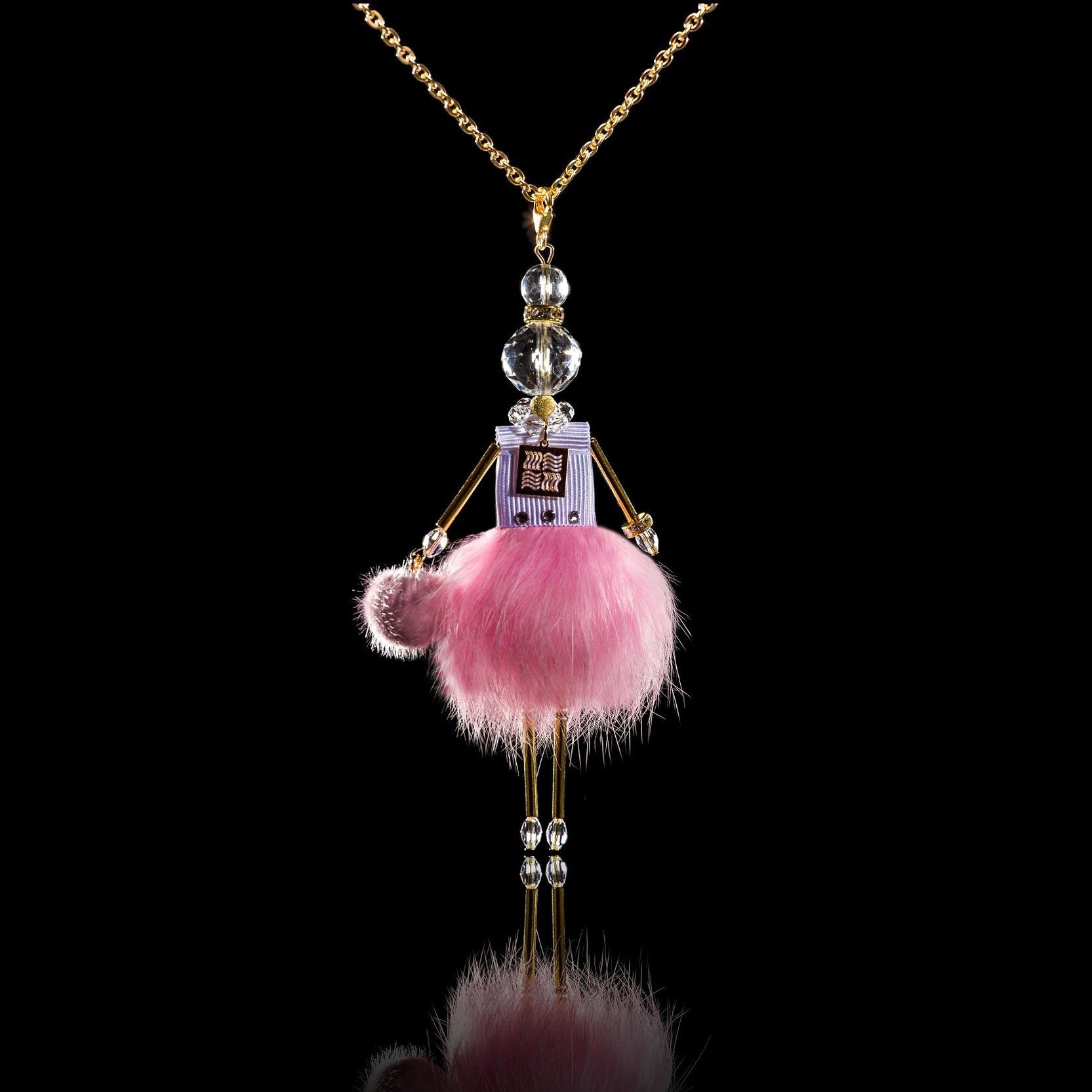 Jewelry doll pendant "Pink Princess" on a black background