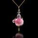 Jewelry doll pendant "Pink Princess" on a black background