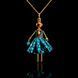 SARANA&reg; Nereida Jewelry Doll Pendant on a black background