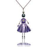 SARANA&reg; Lyra Jewelry Doll Pendant on a chain on a white background