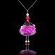 Black Orchid jewelry doll pendant on a black background | evening jewelry aesthetic