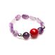 Attractive amethyst bracelet with bright red coral.