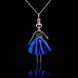 SARANA&reg; Safira Jewelry Doll Pendant on a black background