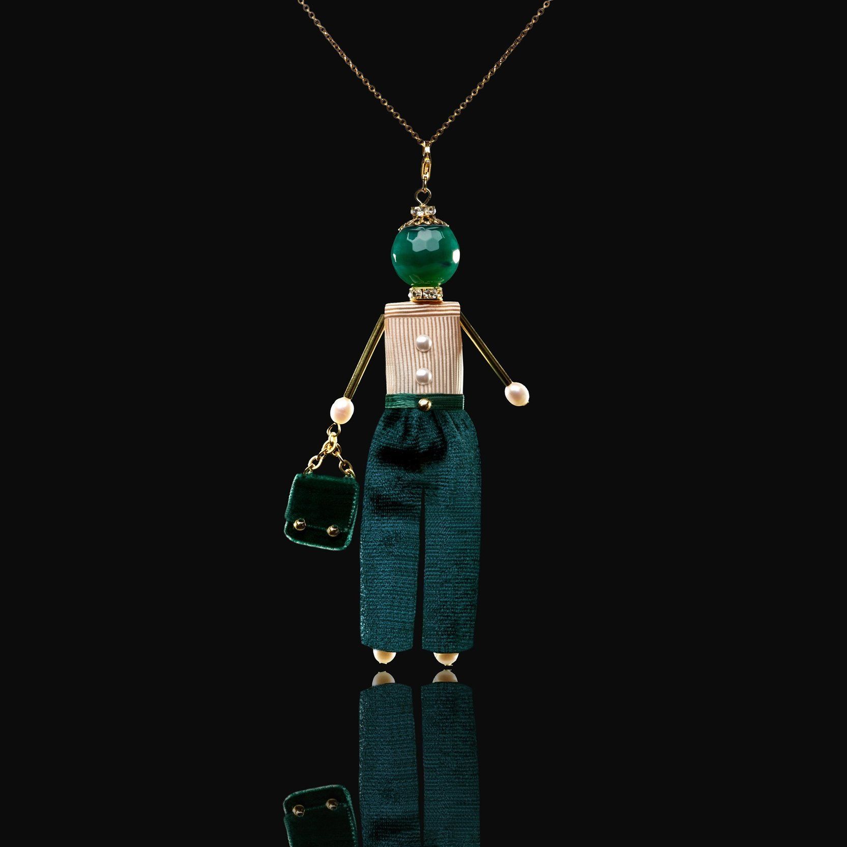 SARANA&reg; &ldquo;Romeo&rdquo; jewelry doll pendant with green agate on a black background