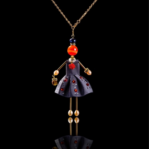 Pendant doll in gray with orange crystals