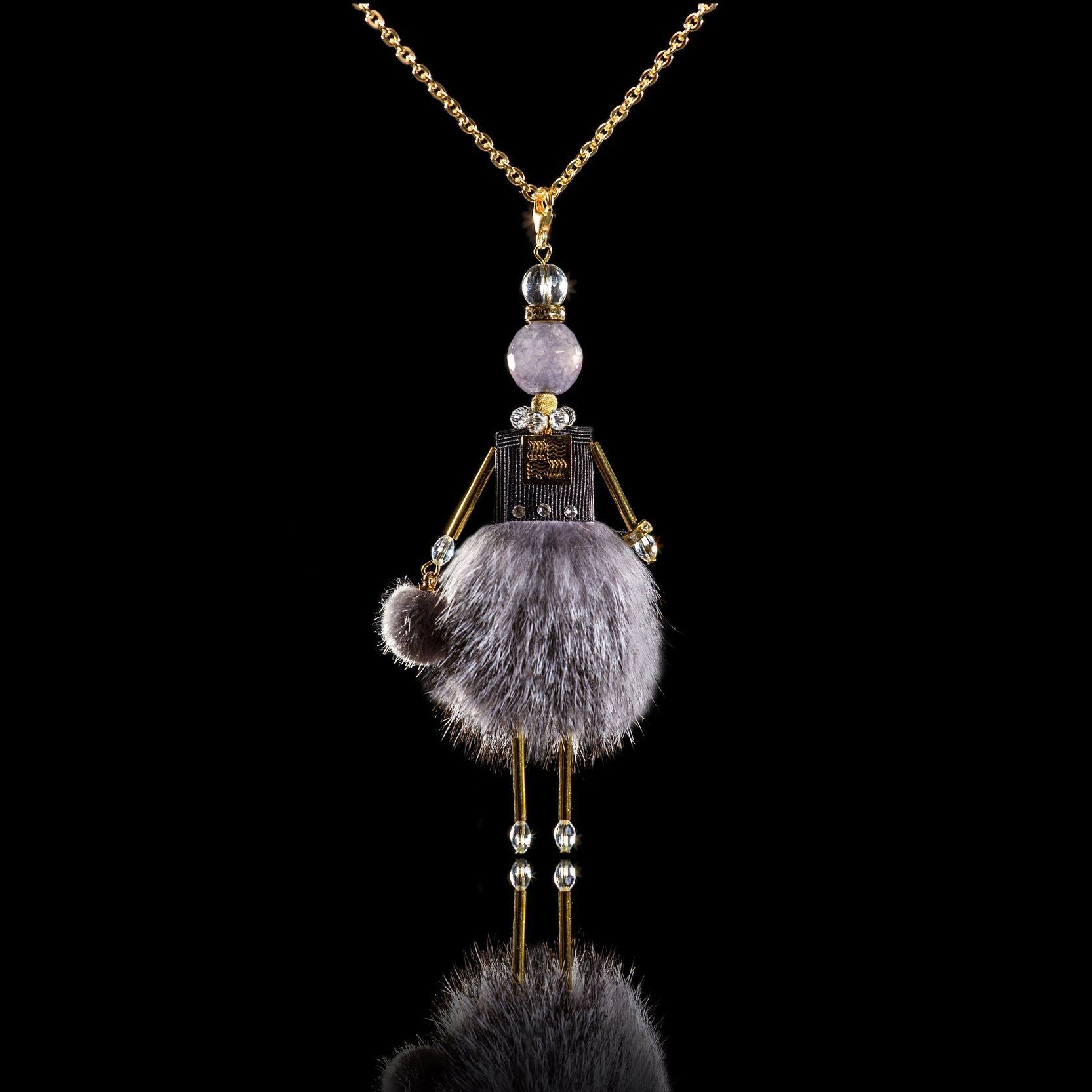 Jewelry doll pendant "Lady in Gray" on a black background