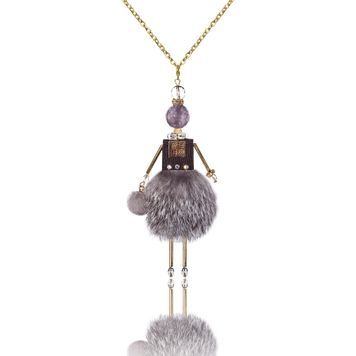 Jewelry doll pendant "Lady in Gray" on a white backgrou