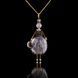 Jewelry doll pendant "Lady in Gray" on a black background