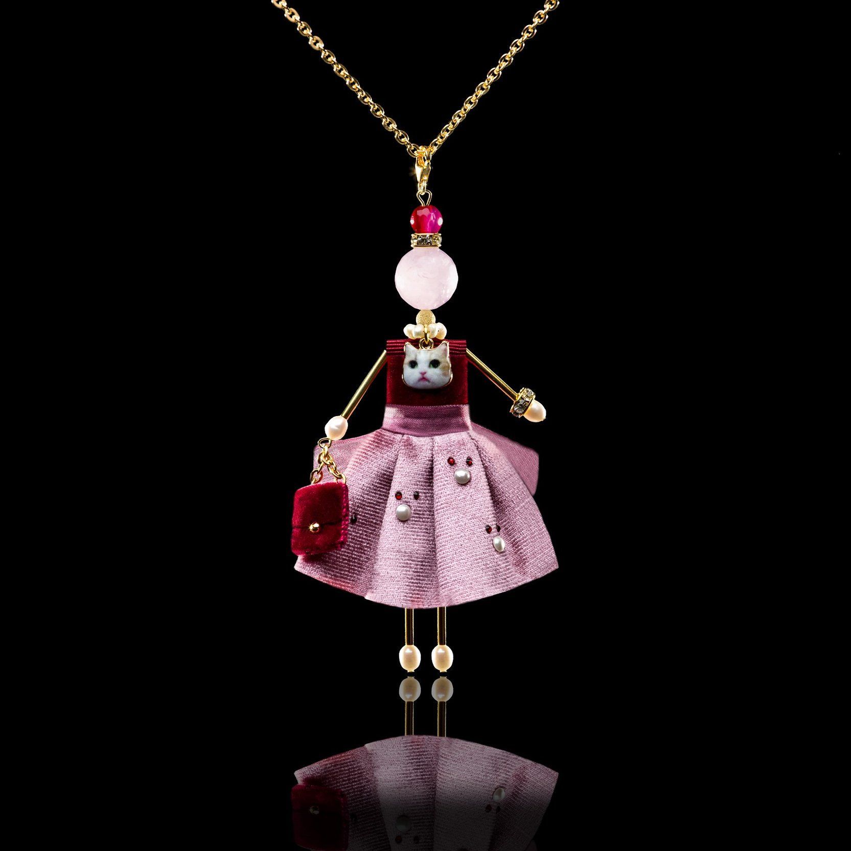 Jewelry doll pendant &ldquo;Emilia&rdquo; on a black background