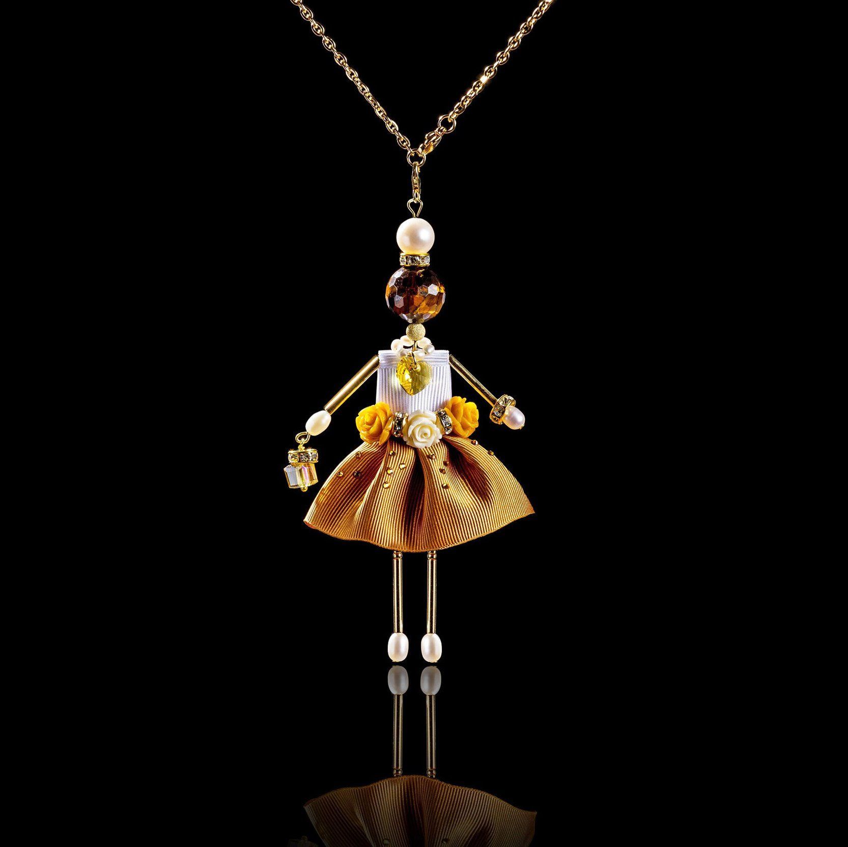 SARANA&reg; Jewelry Doll Pendant &ldquo;Golden Autumn&rdquo; on a black background