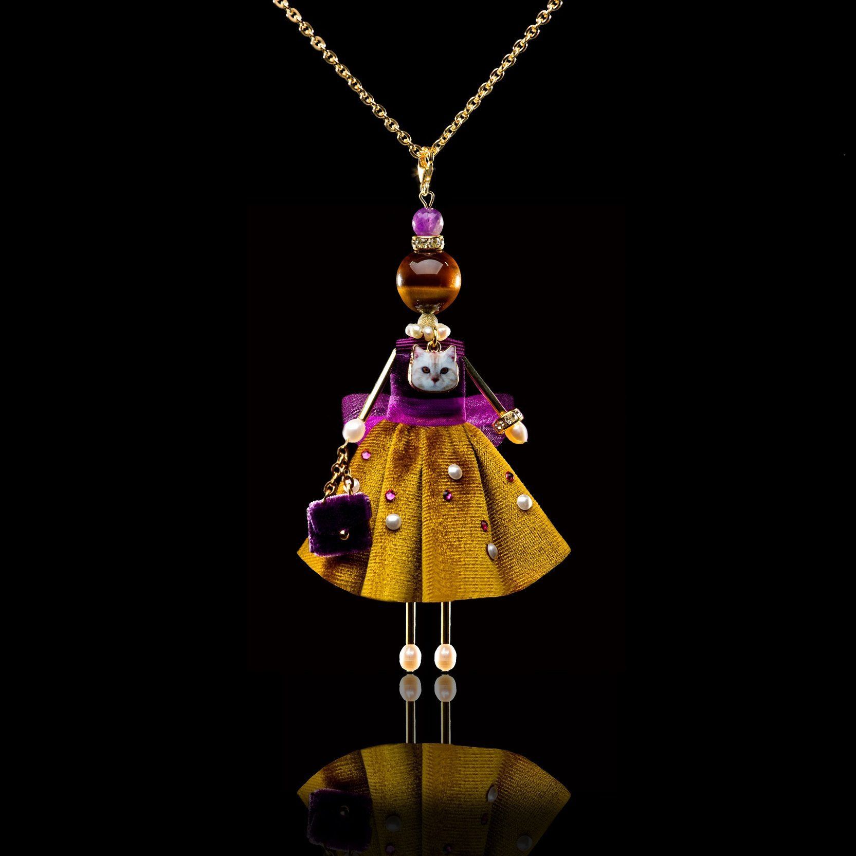 Jewelry doll pendant &ldquo;Tigress&rdquo; on a black background