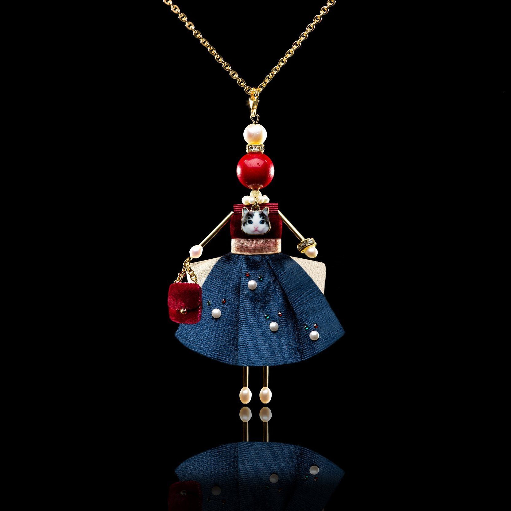 Jewelry doll pendant &ldquo;Coralina&rdquo; on a black background