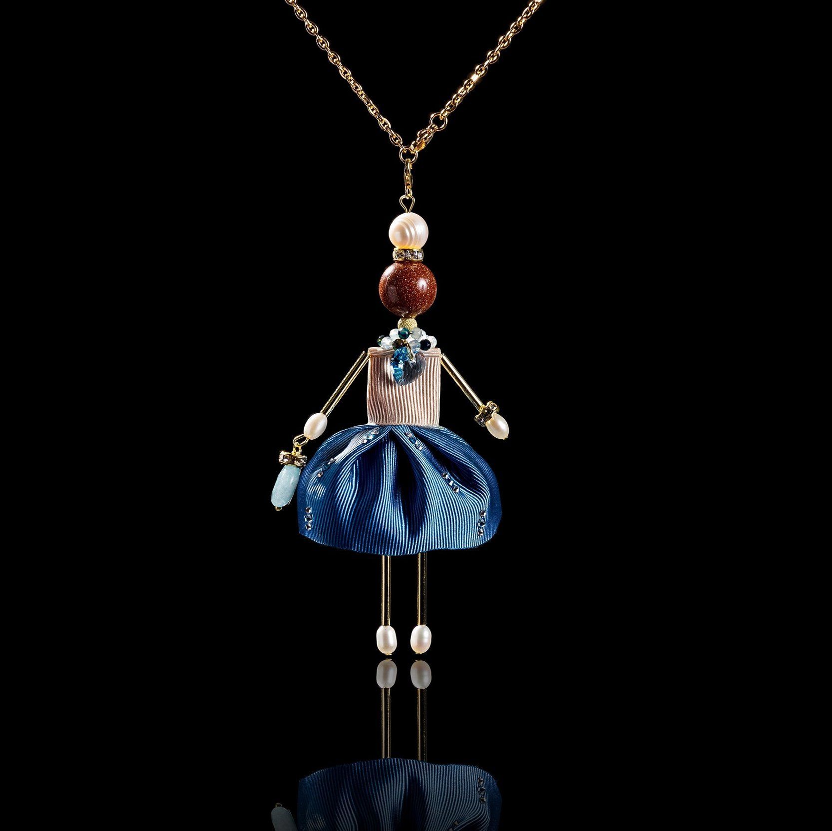 SARANA&reg; Jewelry Doll Pendant &ldquo;Warm Evening&rdquo; on a black background