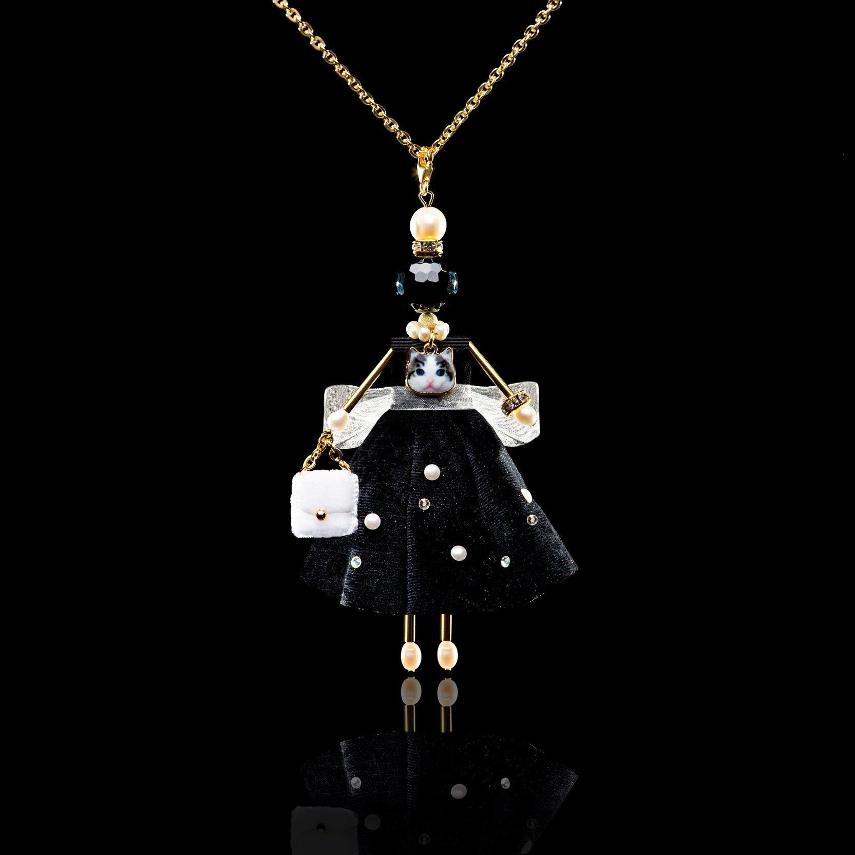 SARANA&reg; &ldquo;Bagheera&rdquo; jewelry doll pendant with black agate on a black background