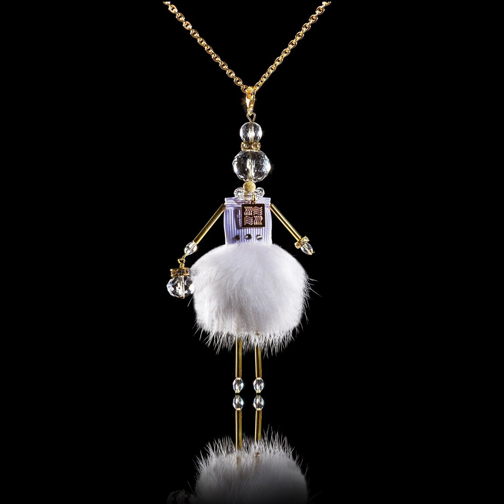 Jewelry doll pendant "Snow-White Tenderness" on a black background