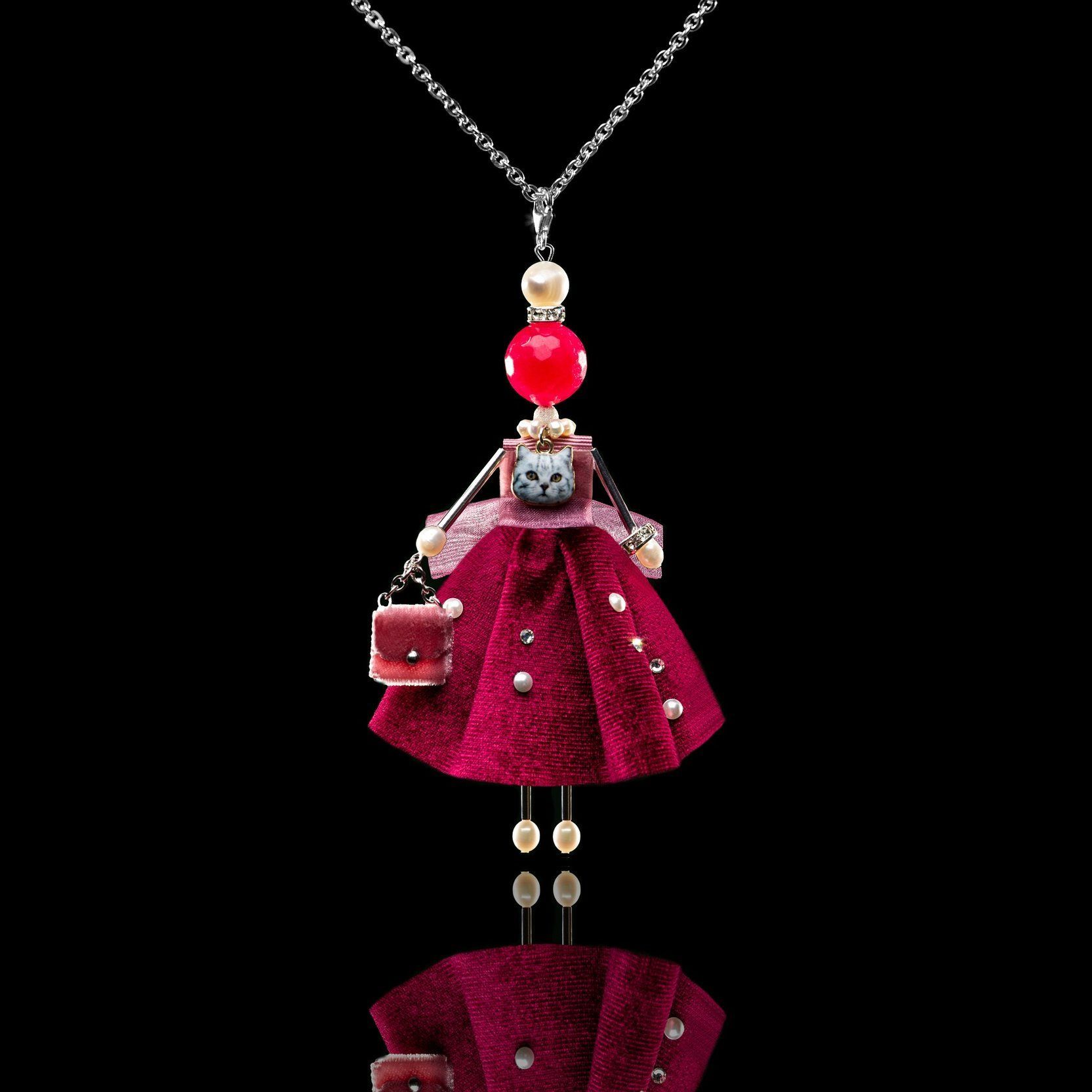 SARANA&reg; &ldquo;Rosalia&rdquo; jewelry doll pendant with Sharon rose-colored agate on a black background