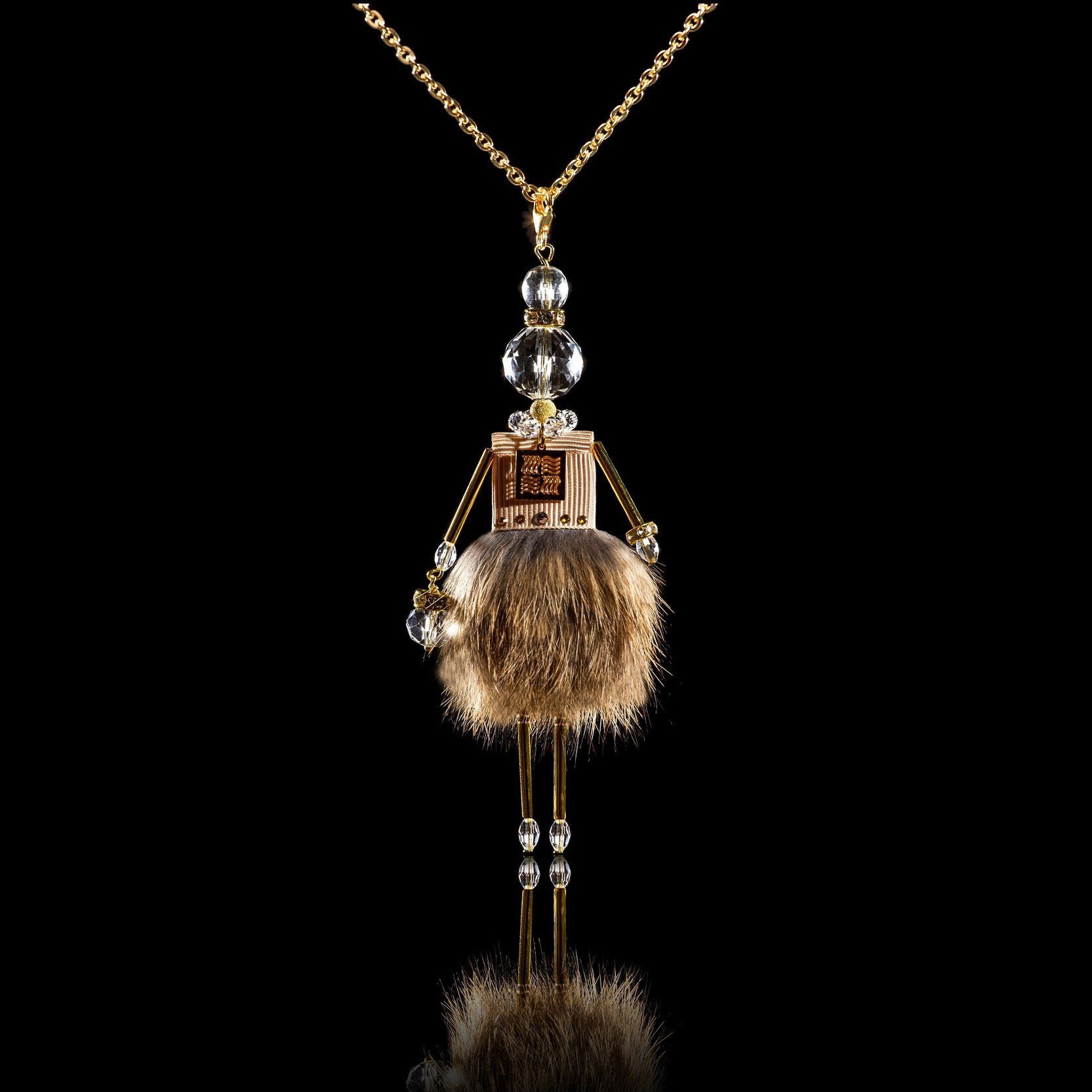 Jewelry doll pendant "Charming Friend" on a black background