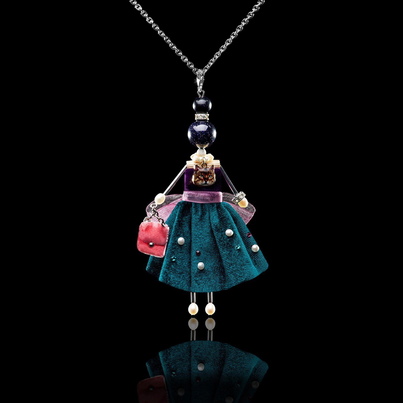 SARANA&reg; &ldquo;Adele&rdquo; jewelry doll pendant with dark blue aventurine on a black background