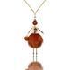 Jewelry doll pendant "Red-haired Beauty" on a white background