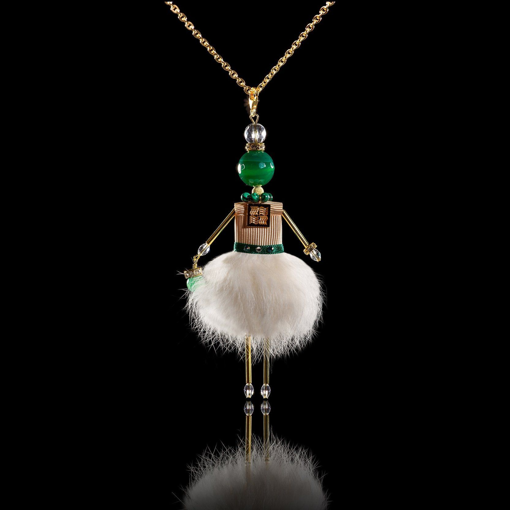 Jewelry doll pendant "Viridian Lady" on a black background